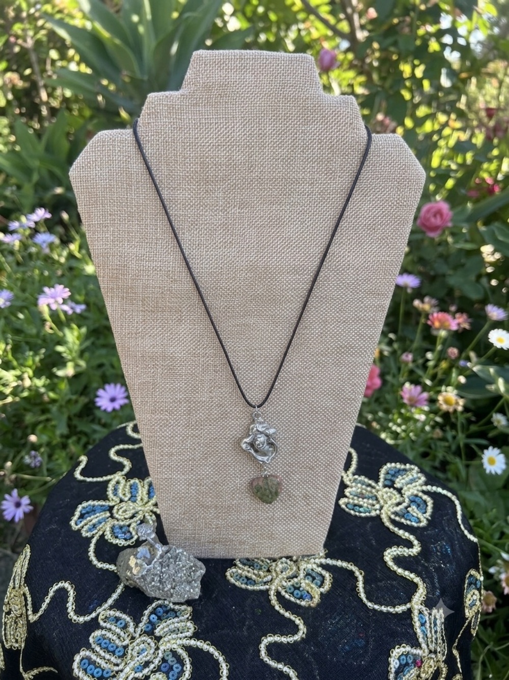 Silver Maiden Pendant Necklace with Green Heart Gem on Black Cord